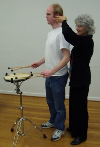 Alexander Technique teacher Phyllis Richmond works with a drummer